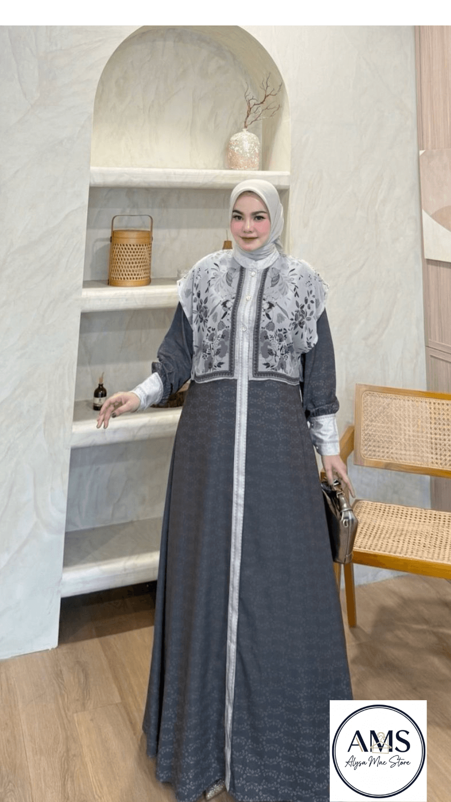 Stylish woman wearing the Elliora Dress V4 in a chic setting, showcasing its elegant design and sophisticated style.